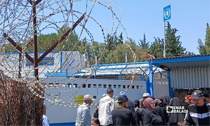 A protest outside the United Nations Disengagement Observer Force, UNDOF, in Quneitra demanding the release of detainees held in Israeli prisons, August 17, 2026. (Enab Baladi)