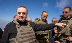 Israeli Defense Minister Israel Katz stands on Mount Hermon, which Israel occupies in southern Syria, March 11, 2025. (Times of Israel/Emanuel Fabian)