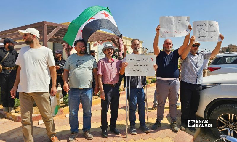 During the protest, demonstrators chanted slogans including, “The people want an end to expropriation,” September 26, 2026. (Enab Baladi/Ahmad Maslamani)