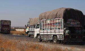 Trucks carrying goods, including vegetables, enter Suwayda governorate from Syrian government controlled areas through the al-Matouna checkpoint north of the governorate, September 6, 2026. (Suwayda Media Directorate)