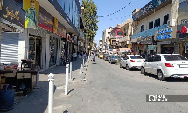 Shops along Umayya Street in Suwayda city, August 11, 2026. (Enab Baladi)