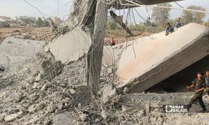 Children play on a house destroyed by a Jordanian airstrike in Muzayrib, Daraa countryside (southern Syria), October 27, 2026 (Enab Baladi/Mahjoub al-Hashish).