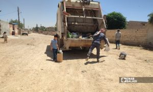 Vehicles transport waste in the Raqqa countryside (northern Syria), July 7, 2026 (Enab Baladi).