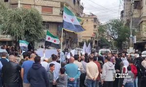 Residents of Jdeidet Artouz al-Balad in the Damascus countryside (southwestern Syria) protest Israeli arrests of Syrians from Quneitra and Daraa, October 30, 2026 (Enab Baladi/Abdullah al-Wanny)